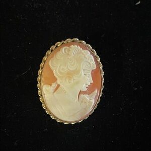 Elegant Gold and Cream Cameo Brooch